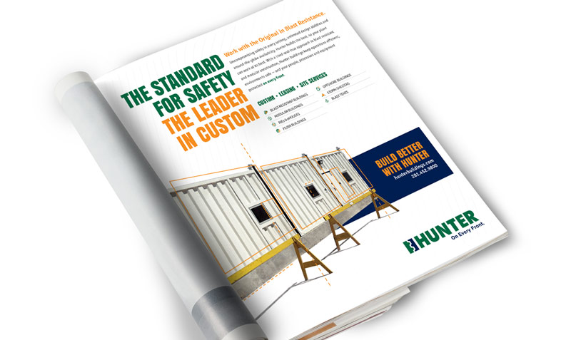 Print ad for an industrial company with green and yellow font and photo of a building with corrugated tin siding.
