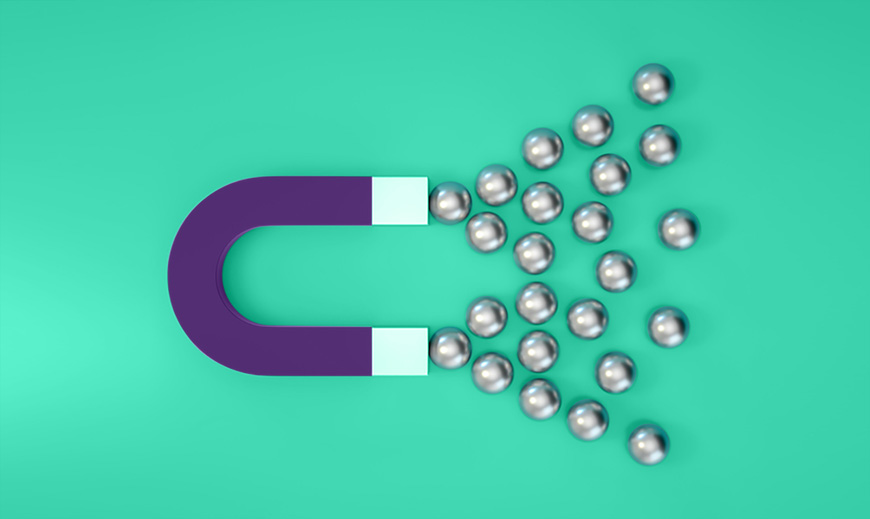 Purple magnet attracting metal balls
