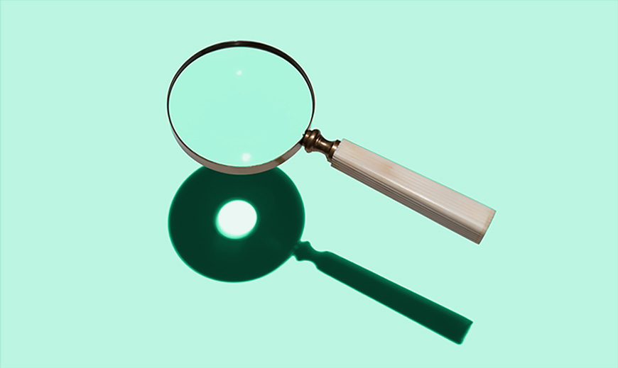 Magnifying glass symbolizing search engine optimization.