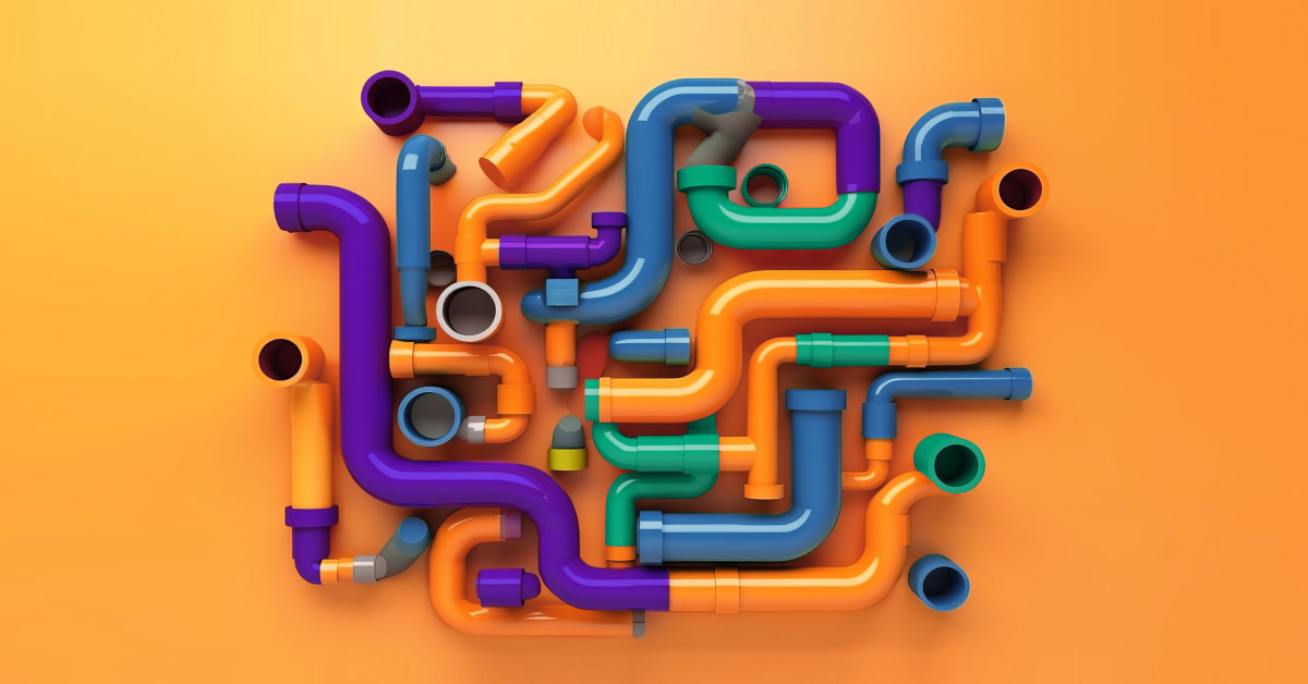 Multicolored pipes on an orange background
